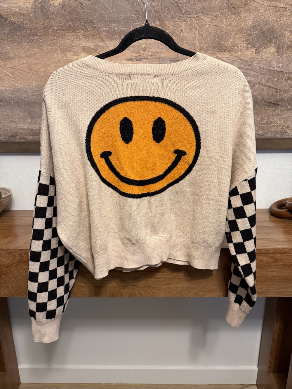 Altar'd State Cream Sweater with Orange Smiley and Black Checkered Sleeves